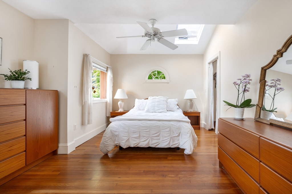 12 Grandview Road Arlington, MA 02476 - Photo 21 of 42 a bedroom with a bed and wooden floor