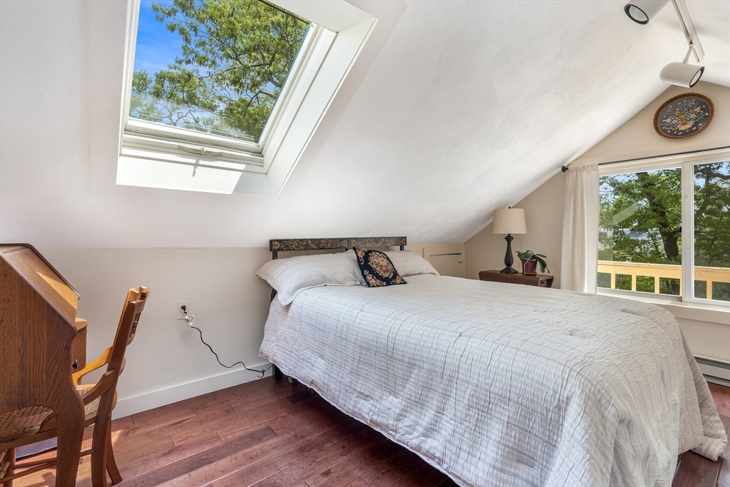 12 Grandview Road Arlington, MA 02476 - Photo 27 of 42 a bedroom with a bed and a window