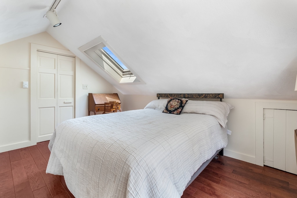 12 Grandview Road Arlington, MA 02476 - Photo 28 of 42 a bedroom with bed and wooden floor
