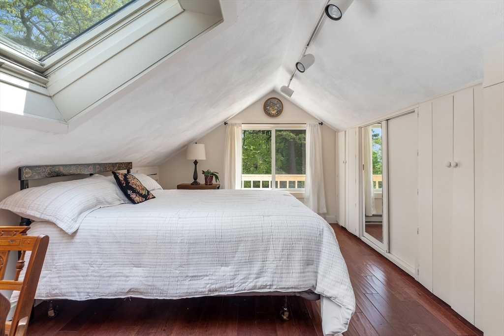 12 Grandview Road Arlington, MA 02476 - Photo 29 of 42 a bedroom with a large bed and a large window