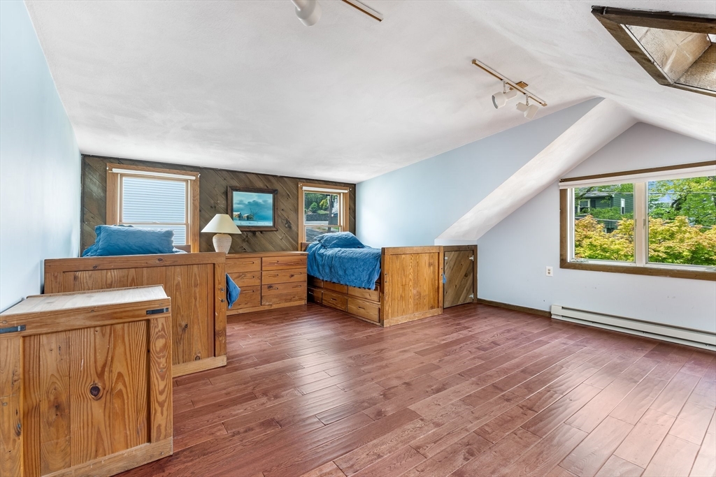 12 Grandview Road Arlington, MA 02476 - Photo 30 of 42 a living room with furniture and a wooden floor