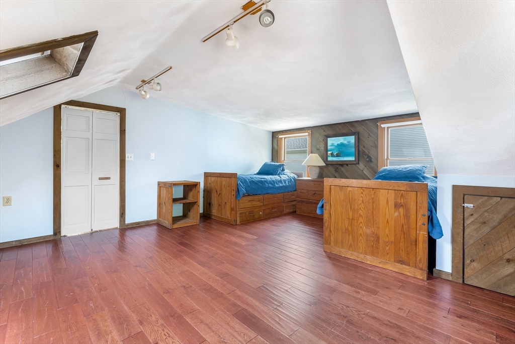 12 Grandview Road Arlington, MA 02476 - Photo 31 of 42 a living room with furniture and a wooden floor