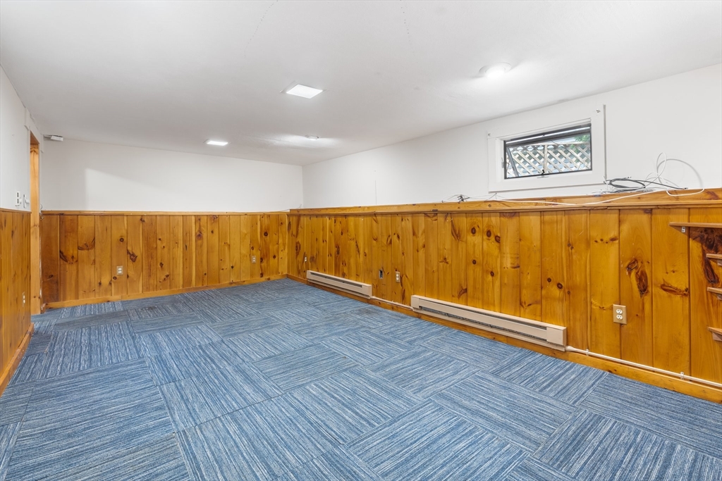 12 Grandview Road Arlington, MA 02476 - Photo 32 of 42 a view of an empty room with wooden floor