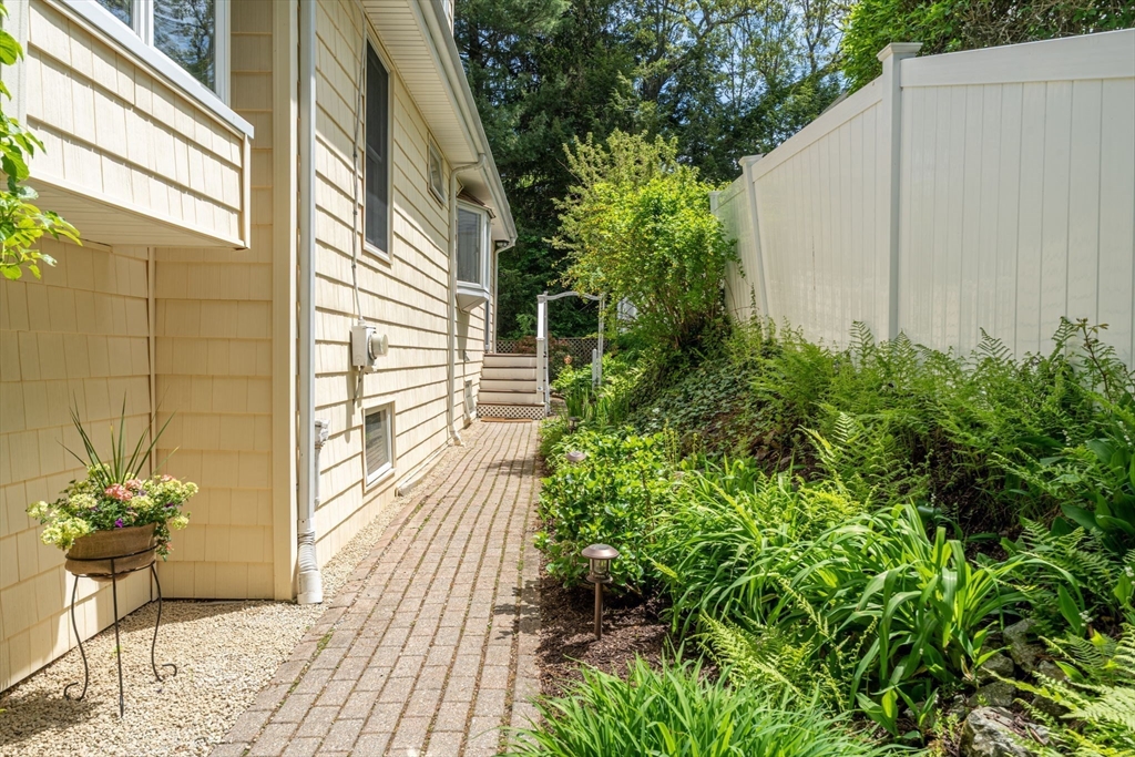 12 Grandview Road Arlington, MA 02476 - Photo 41 of 42 a view of a pathway of a house with backyard