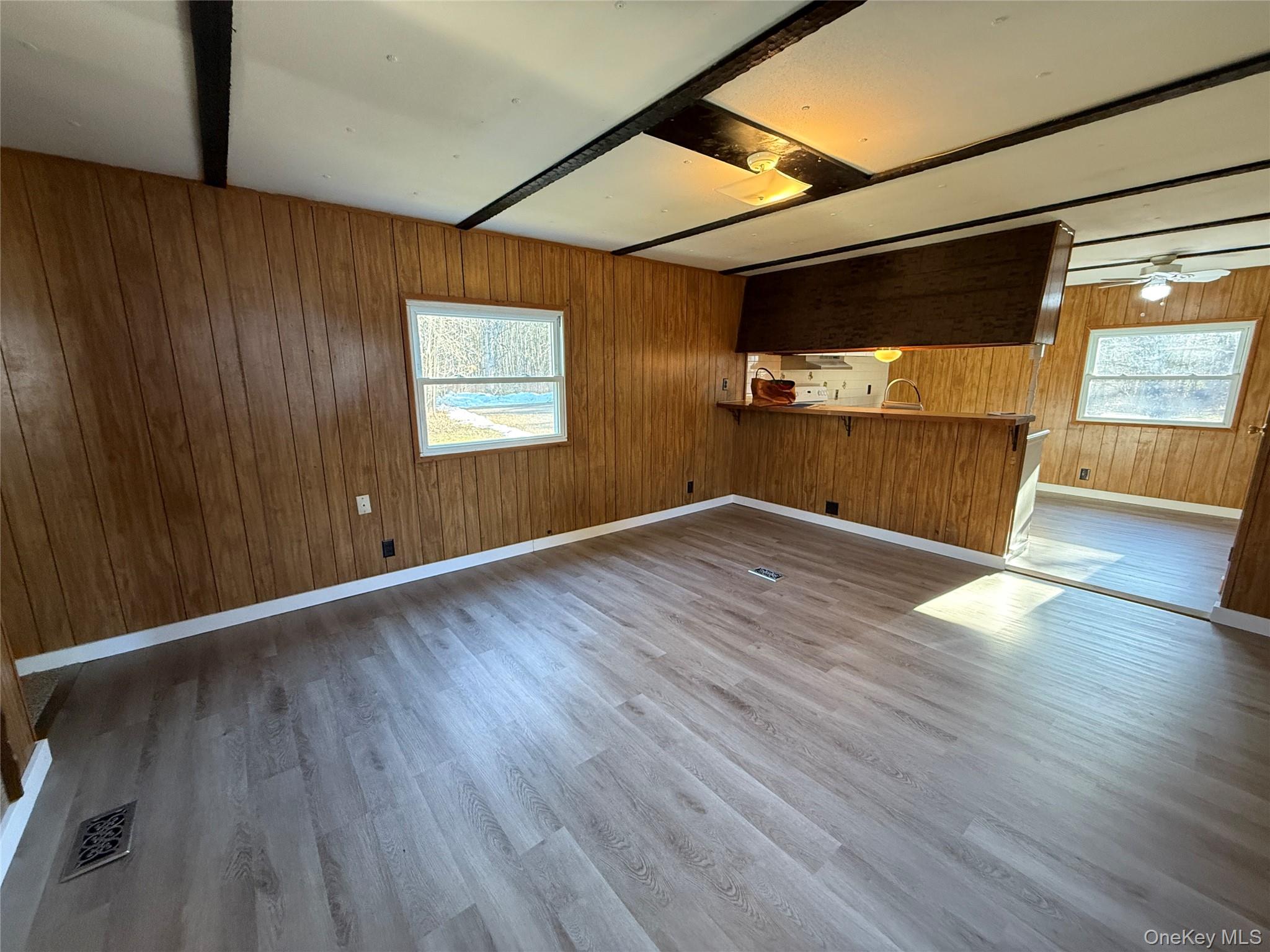 25 Fawn Road, Unit LOT 1 Saugerties, NY 12477 - Photo 13 of 23 a view of an empty room with wooden floor and a window