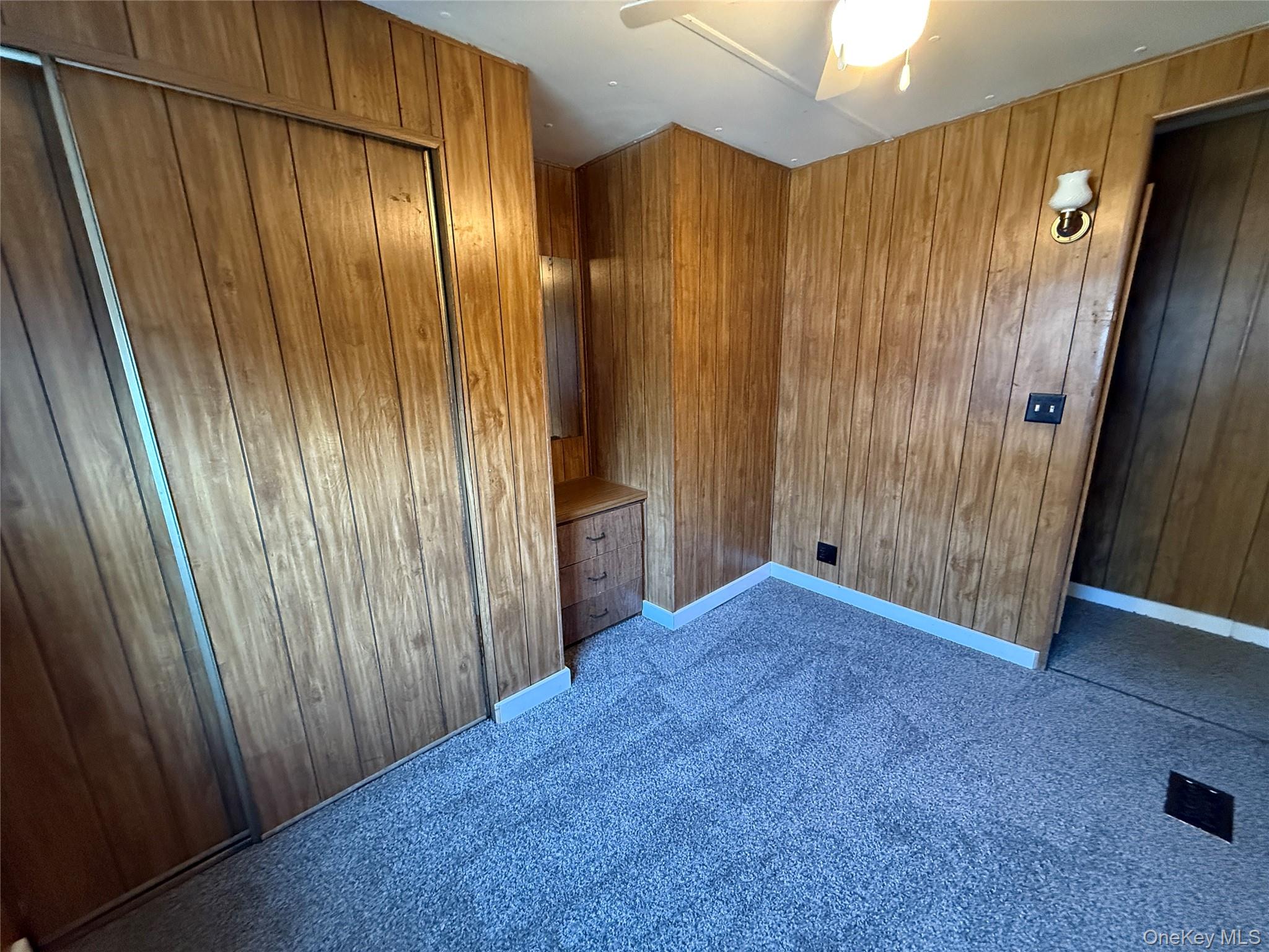 25 Fawn Road, Unit LOT 1 Saugerties, NY 12477 - Photo 17 of 23 a view of an empty room with wooden walls