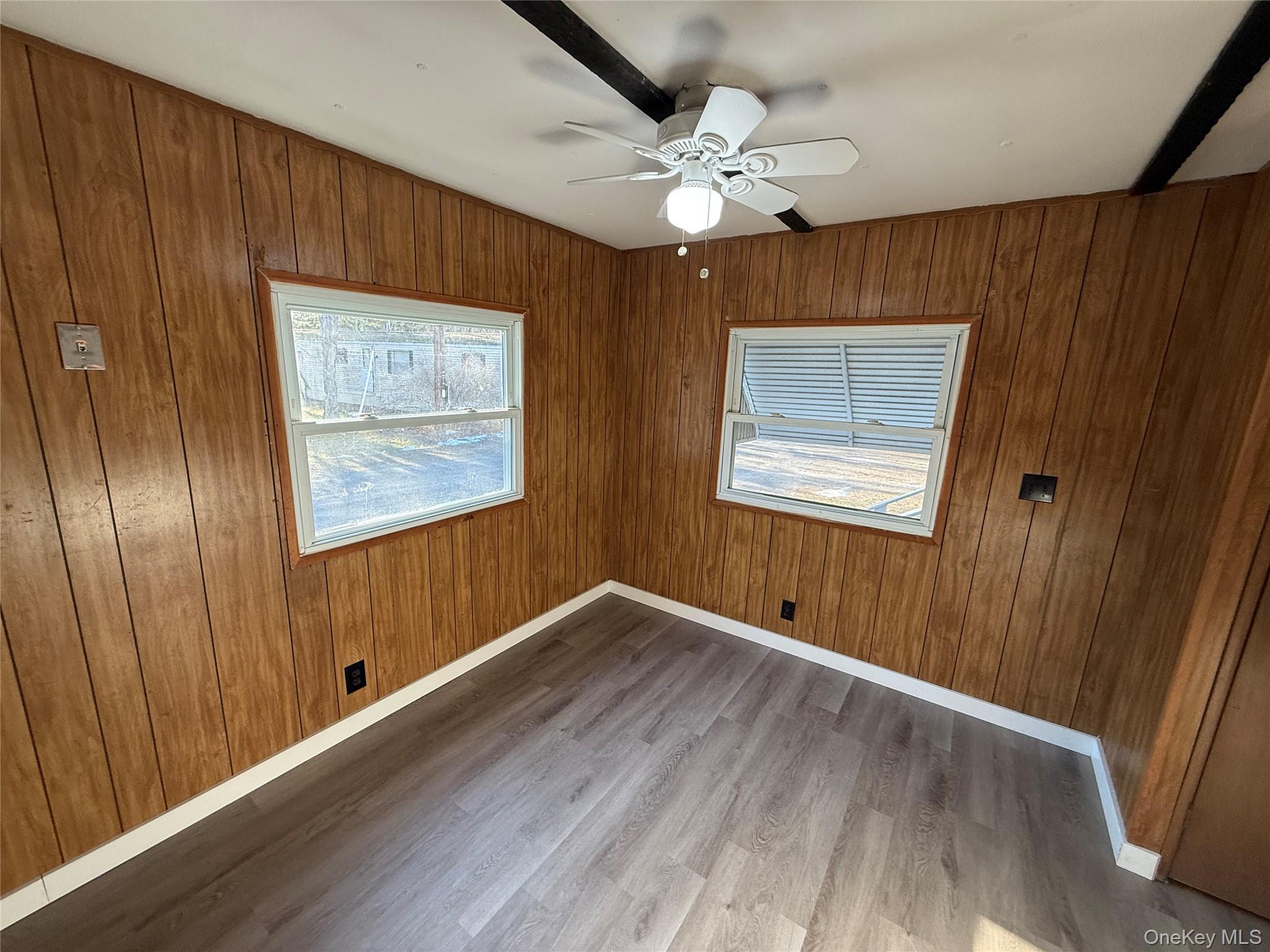 25 Fawn Road, Unit LOT 1 Saugerties, NY 12477 - Photo 5 of 19 a view of an empty room with wooden floor and fan