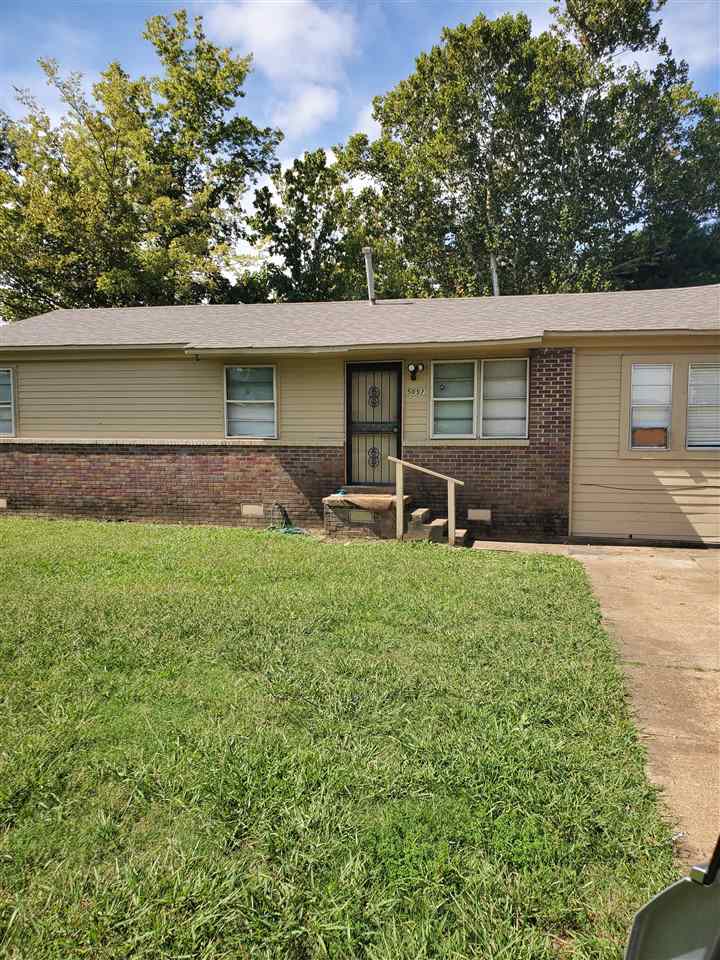 5057 Gill Road Memphis, TN 38109 - Photo 1 of 1 front view of a house with a yard