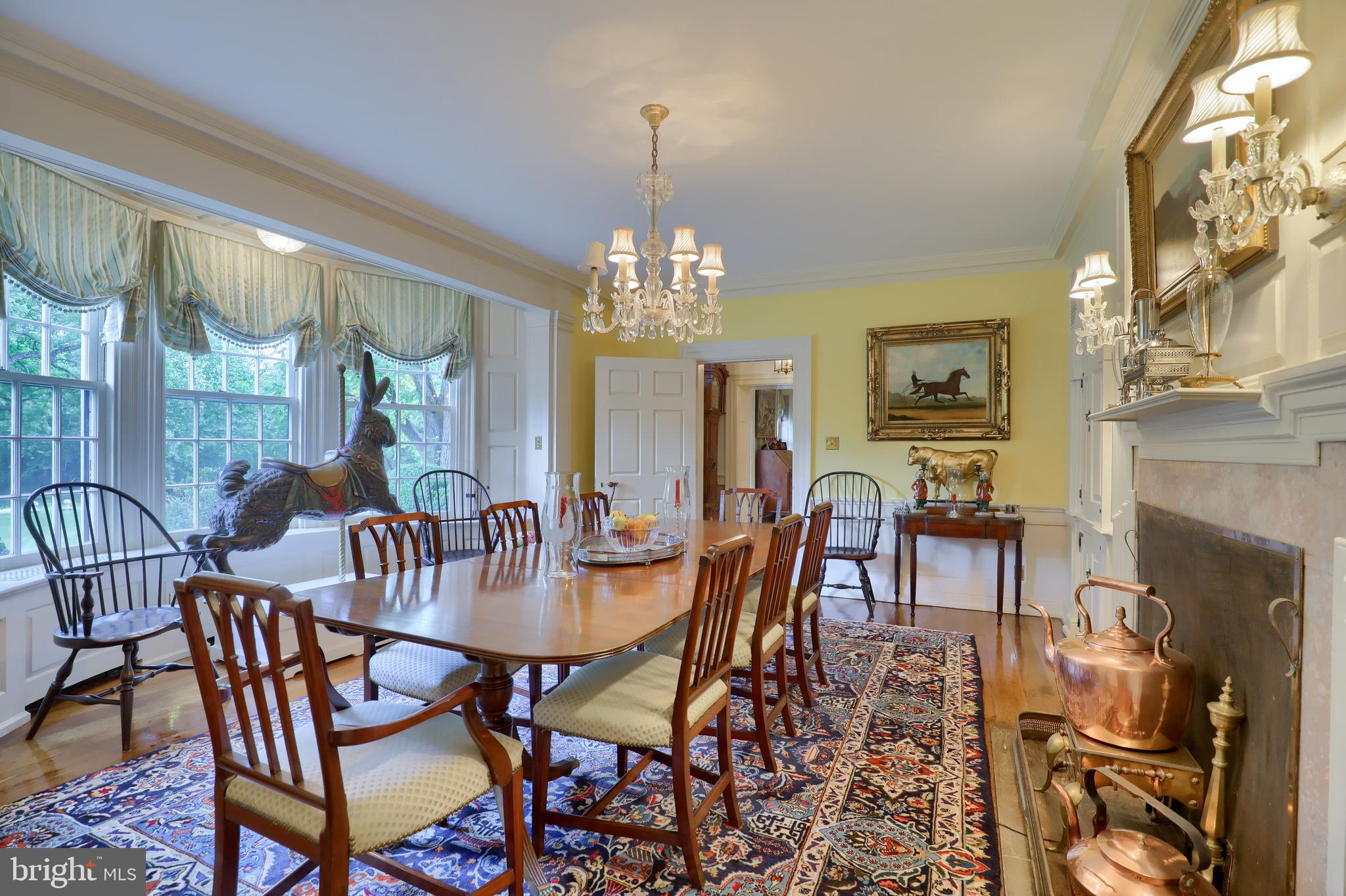 140 Evans Hill Road Reading, PA 19608 - Photo 15 of 70 a view of a dining room with furniture a chandelier and wooden floor