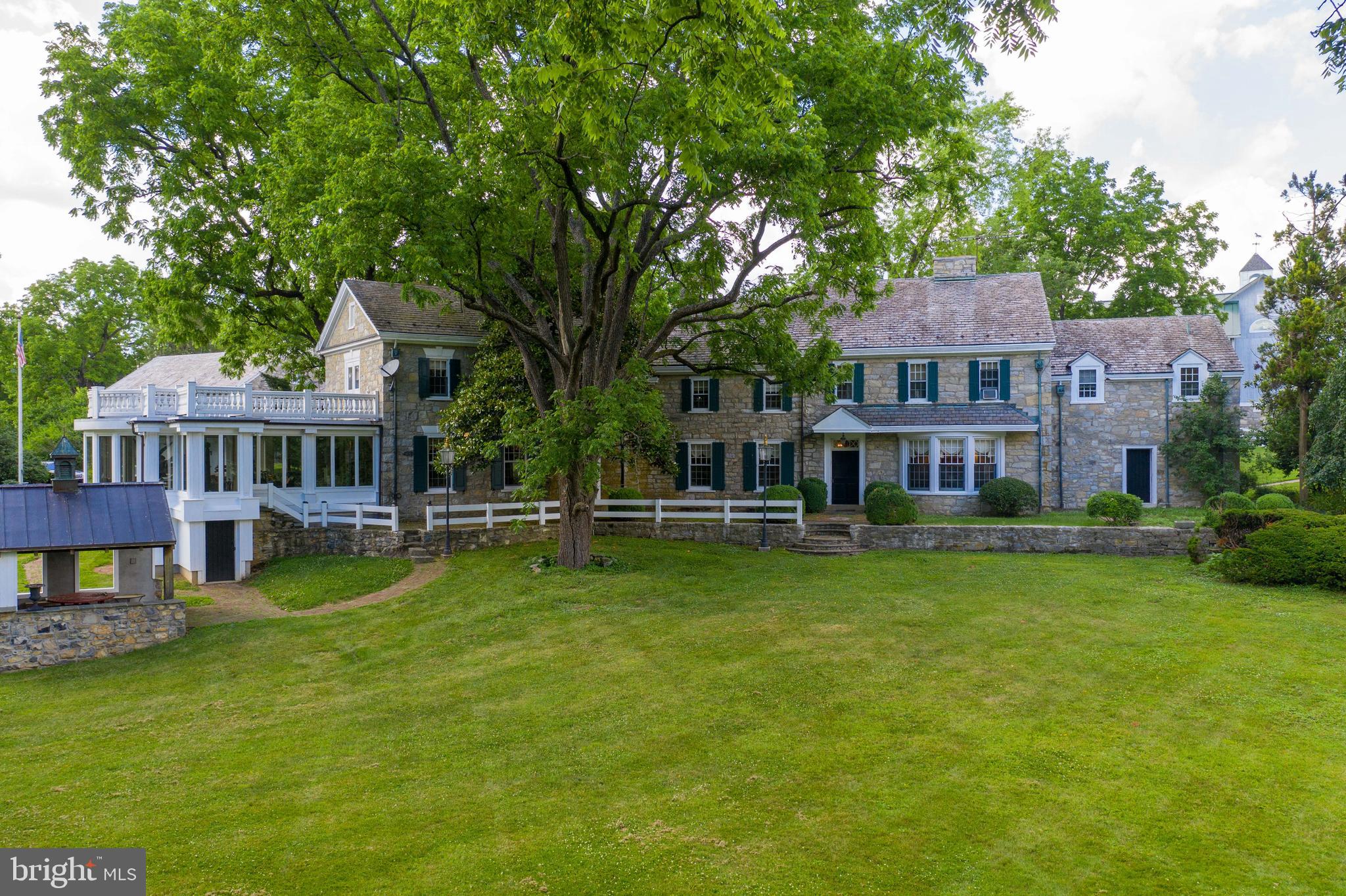 140 Evans Hill Road Reading, PA 19608 - Photo 37 of 70 a front view of a house with garden and trees