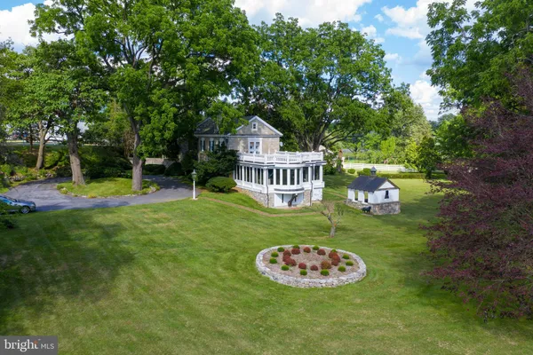 a view of a house with a big yard