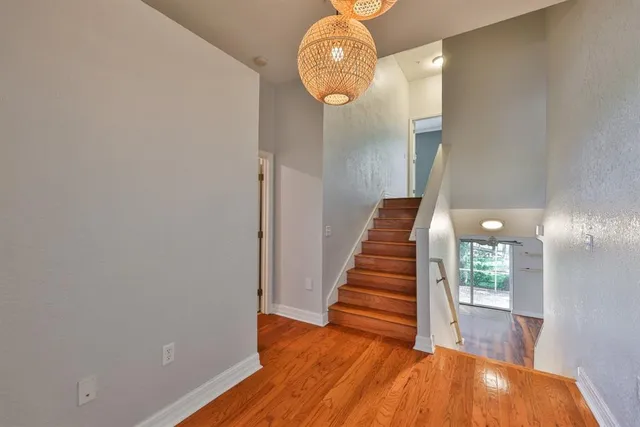 a view of entryway with wooden floor
