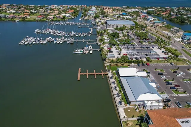 an aerial view of a house with a ocean view