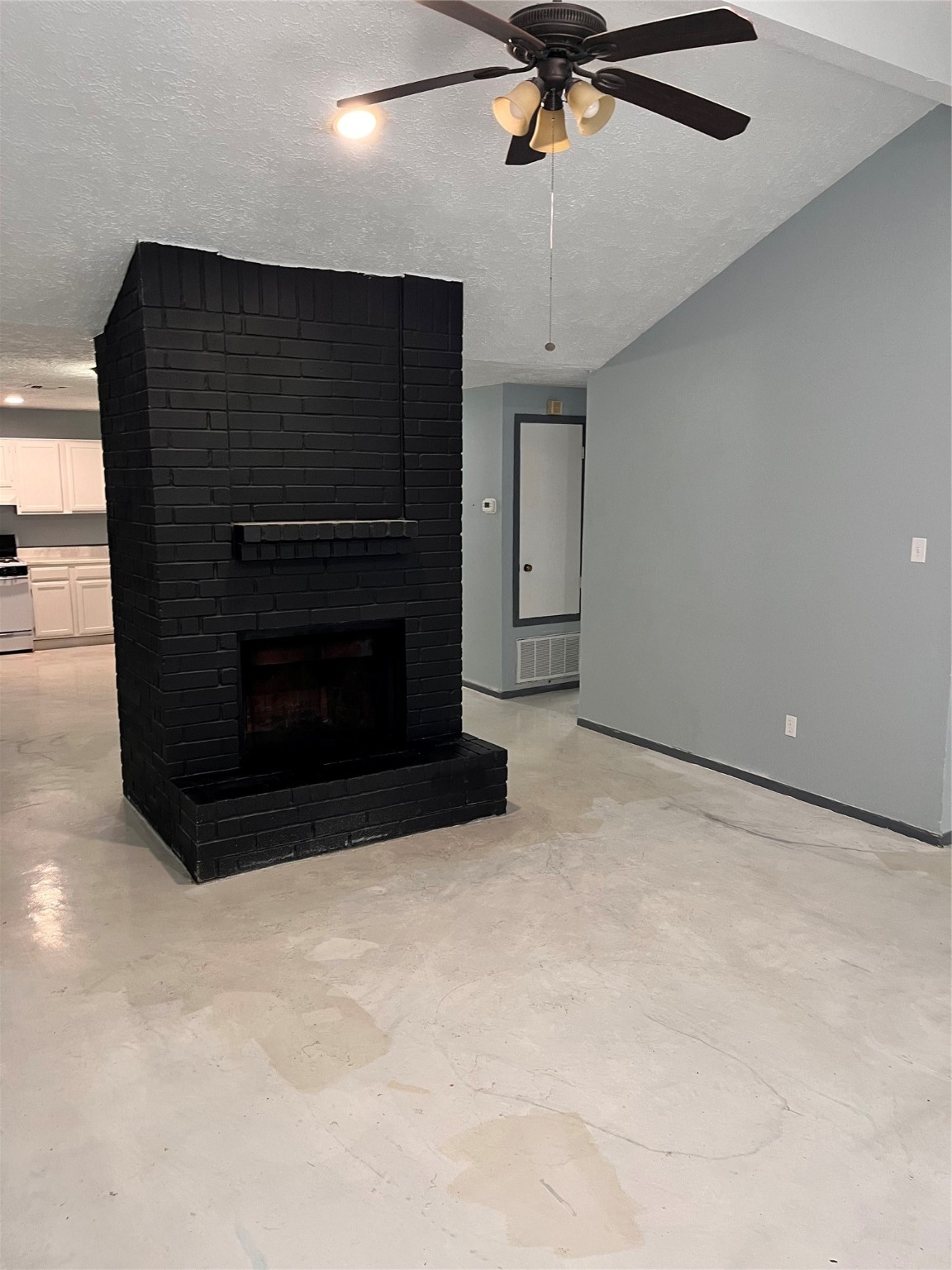 16631 Gold Ridge Lane Houston, TX 77053 - Photo 16 of 18 a view of an empty room with a ceiling fan