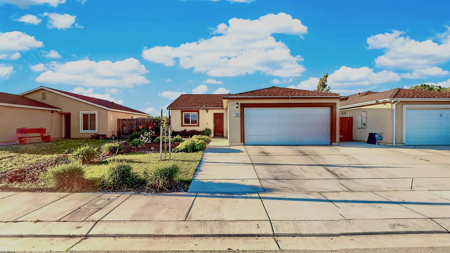 753 Taryn Court Merced, CA 95341 - Photo 1 of 21 a front view of house with yard
