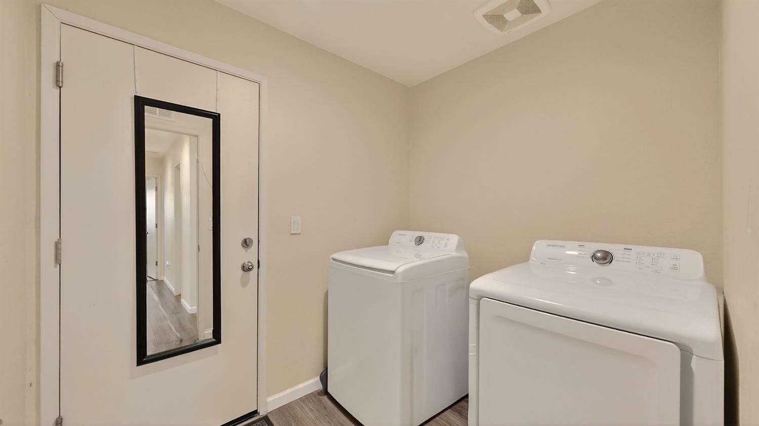 753 Taryn Court Merced, CA 95341 - Photo 13 of 21 a utility room with dryer and washer