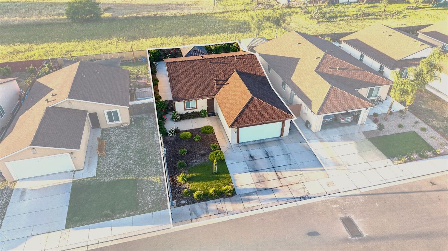 753 Taryn Court Merced, CA 95341 - Photo 15 of 21 an aerial view of residential houses with outdoor space and ocean view