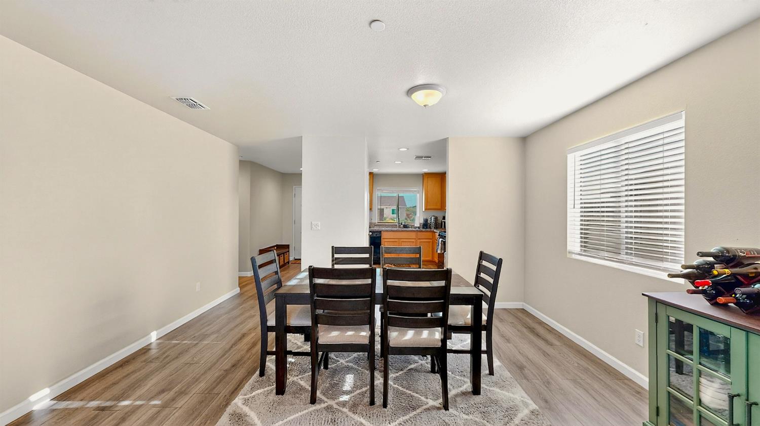 753 Taryn Court Merced, CA 95341 - Photo 4 of 21 a view of a dining room with furniture and window