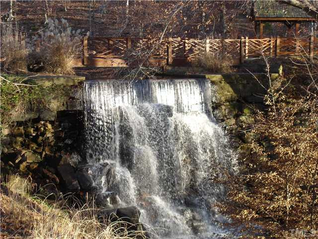 5256 Mill Dam Road Wake Forest, NC 27587 - Photo 24 of 25 ~This shot was taken when the water levels were high and the waterfall at the entrance was in full force. Just beautiful.~