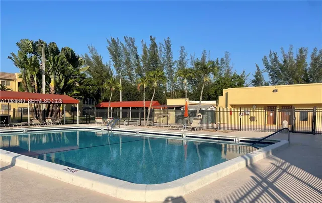 a view of a house with swimming pool