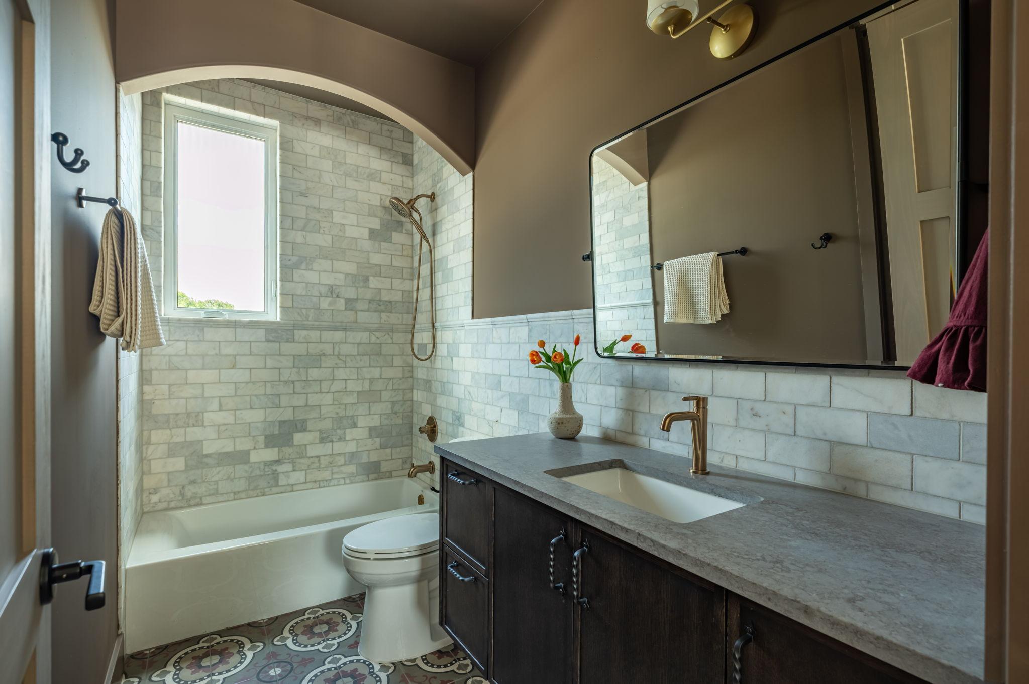 4713 Bolm Road Austin, TX 78702 - Photo 35 of 40 Bathroom featuring a dark wood-finish vanity with an integrated rectangular sink and a solid surface countertop