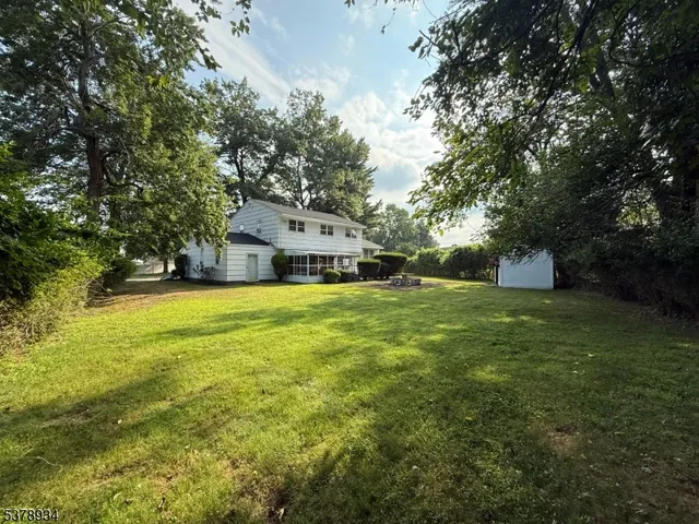 a house view with a outdoor space