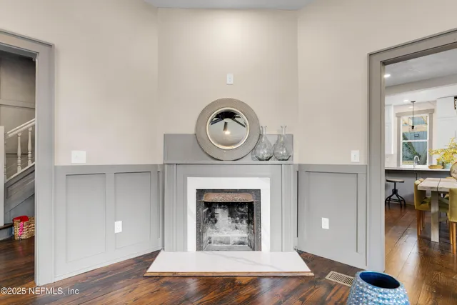 a view of a livingroom with furniture and a fireplace