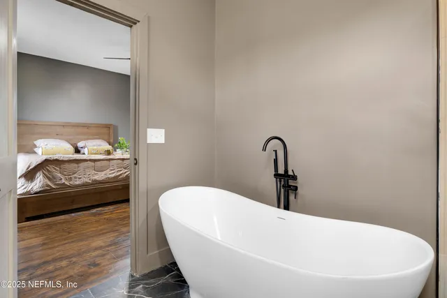 a bathroom with a sink and a bathtub
