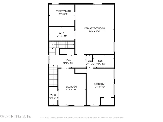 a picture of a bench in front of a gate