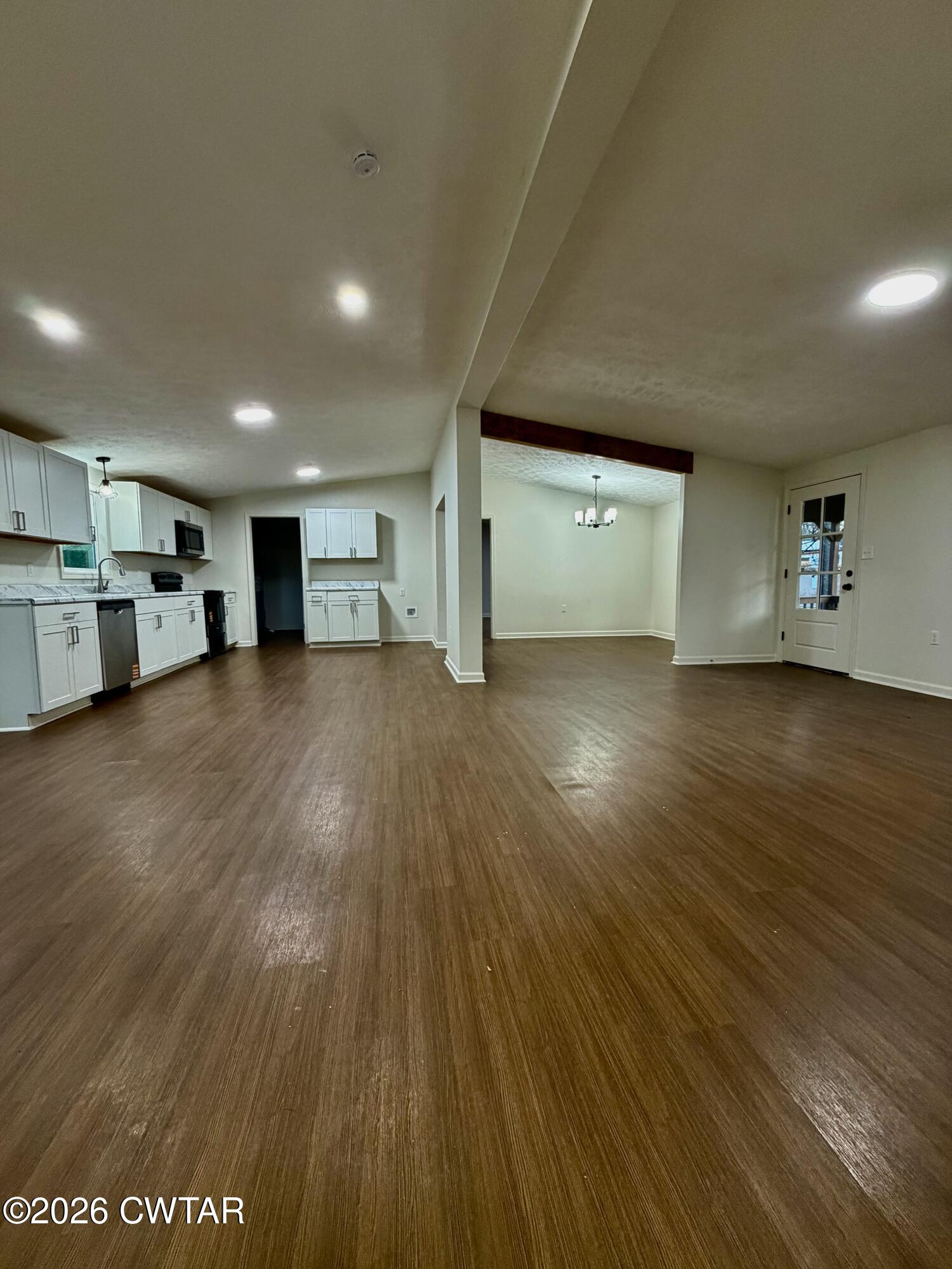 557 Lower Brownsville Road Jackson, TN 38301 - Photo 5 of 20 Lving Room & Kitchen