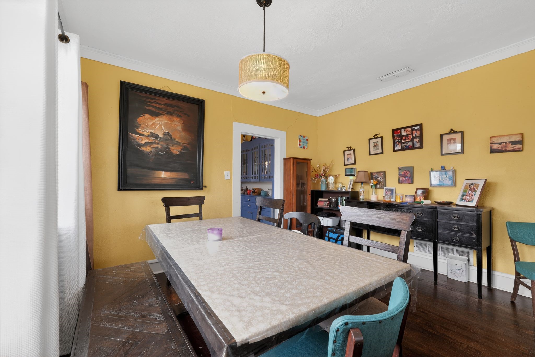 1017 North 11th Street Temple, TX 76501 - Photo 17 of 25 a dining room with a wooden table and chairs