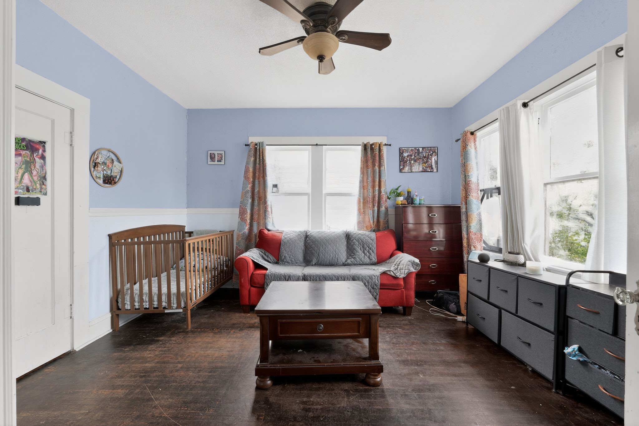 1017 North 11th Street Temple, TX 76501 - Photo 10 of 25 a living room with furniture and windows