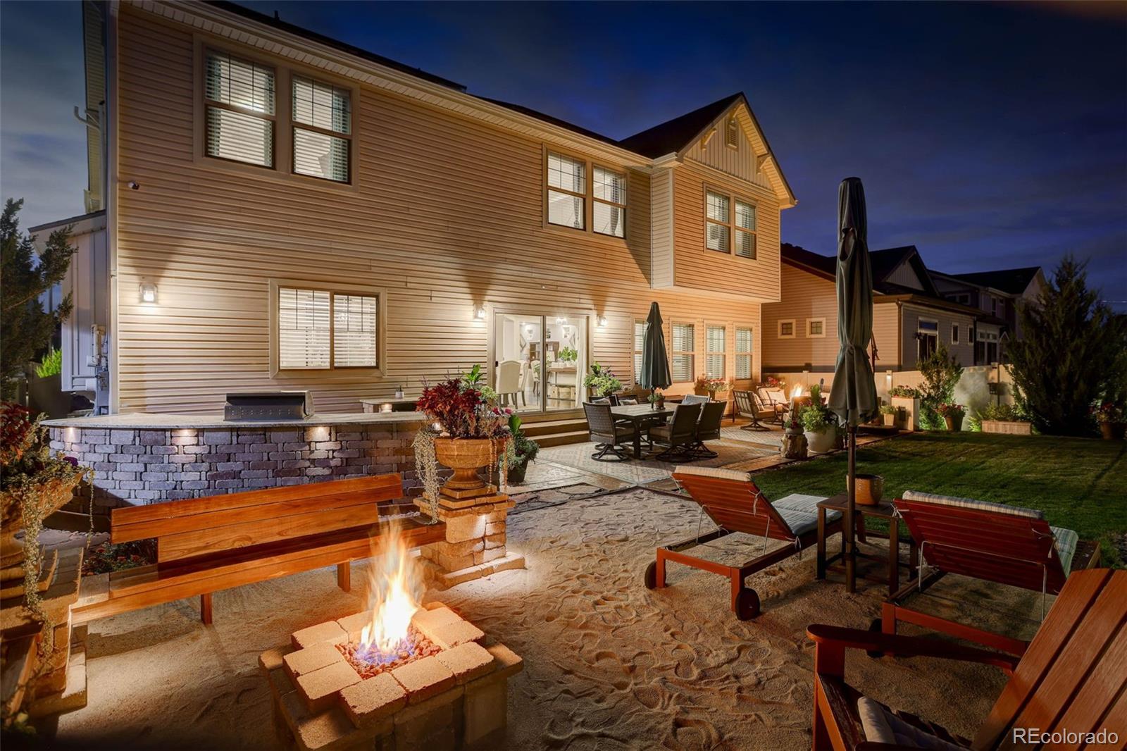 5012 Liverpool Street Denver, CO 80249 - Photo 42 of 49 a building outdoor space with patio furniture