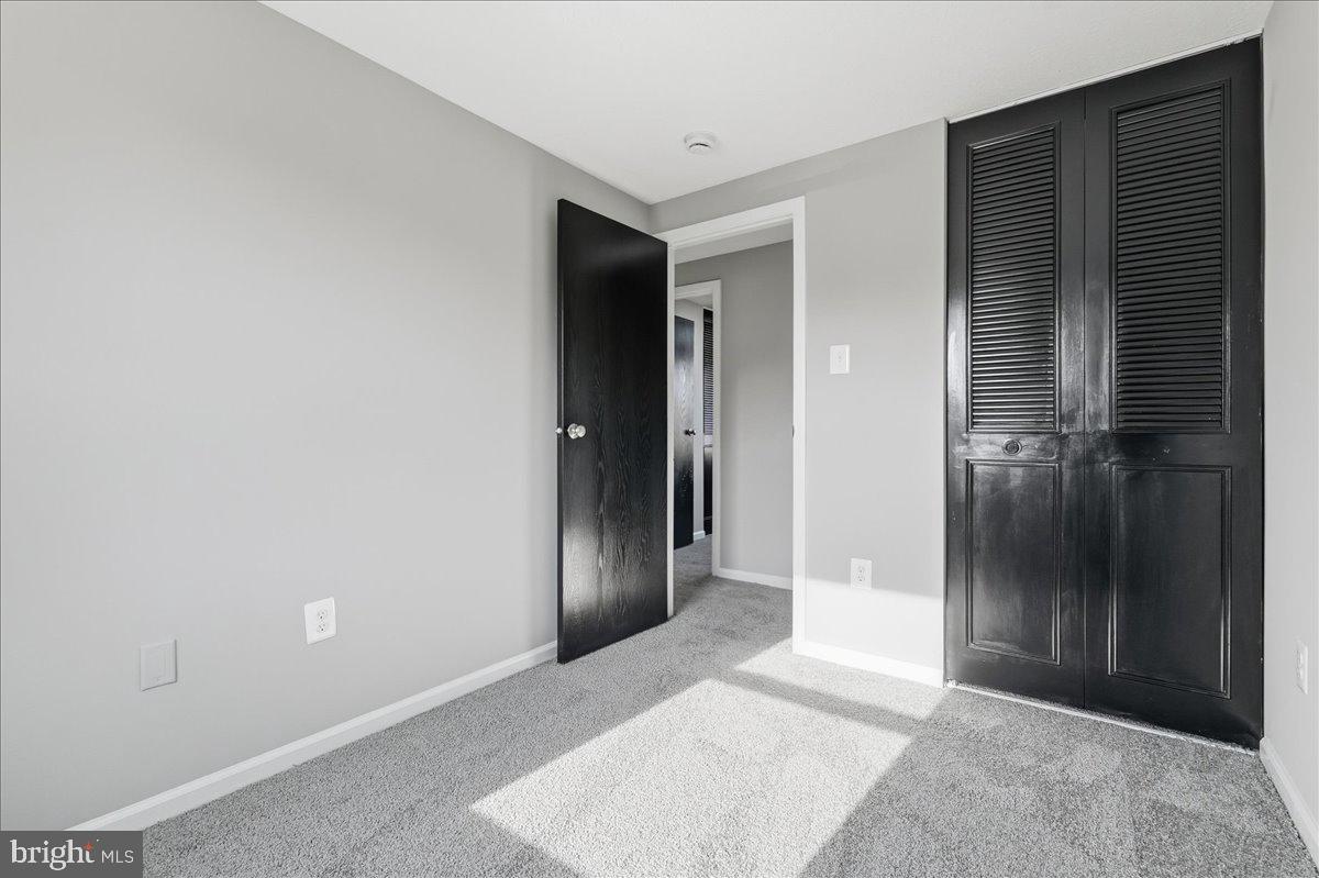 427 Heather Ridge Drive Frederick, MD 21702 - Photo 12 of 18 an empty room with an entrance to other room