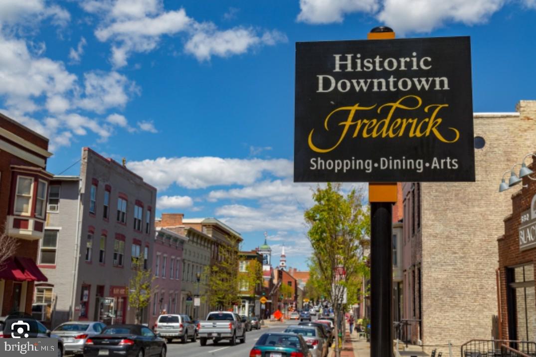 427 Heather Ridge Drive Frederick, MD 21702 - Photo 17 of 17 a street sign on a brick wall