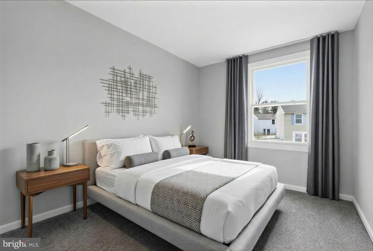 427 Heather Ridge Drive Frederick, MD 21702 - Photo 6 of 18 a bedroom with a bed and window