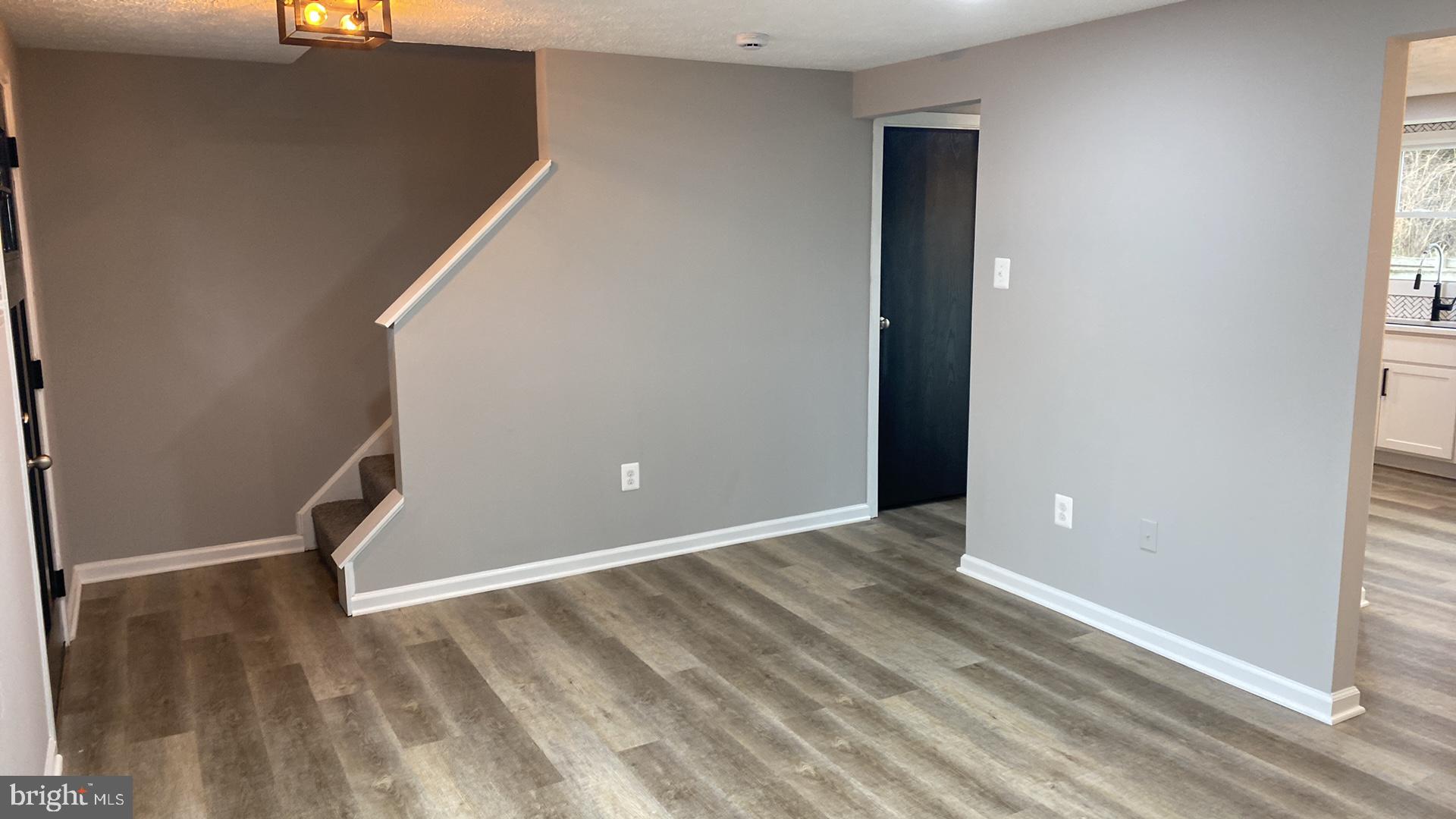 427 Heather Ridge Drive Frederick, MD 21702 - Photo 7 of 17 an empty room with windows