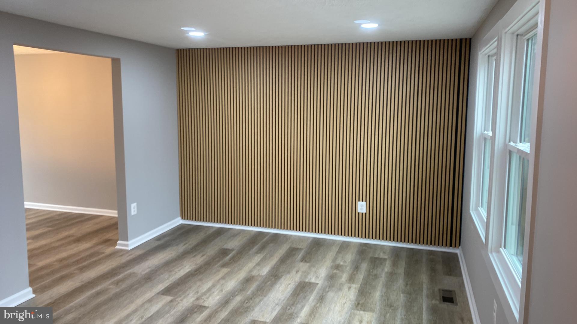 427 Heather Ridge Drive Frederick, MD 21702 - Photo 8 of 17 a view of an empty room with wooden floor