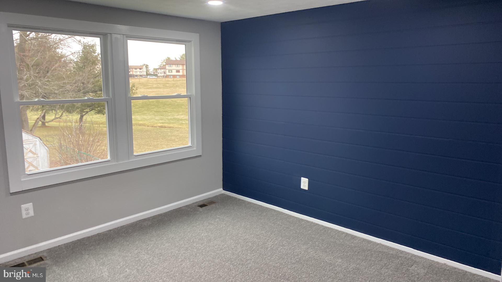 427 Heather Ridge Drive Frederick, MD 21702 - Photo 10 of 17 a view of an empty room with a window