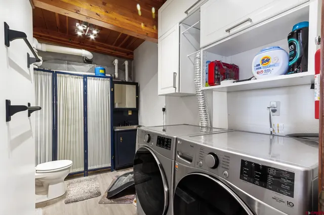 a utility room with dryer and washer