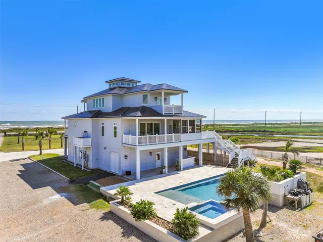 a view of a house with a ocean view