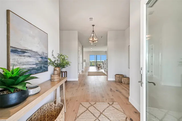 wooden floor in a room with a window