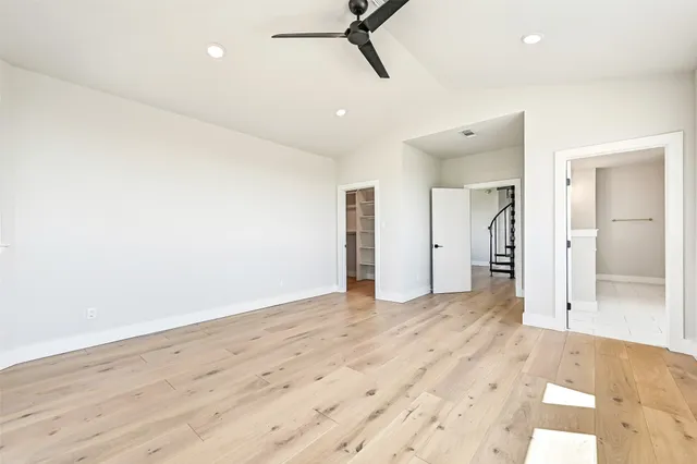 a bathroom with a tub and shower
