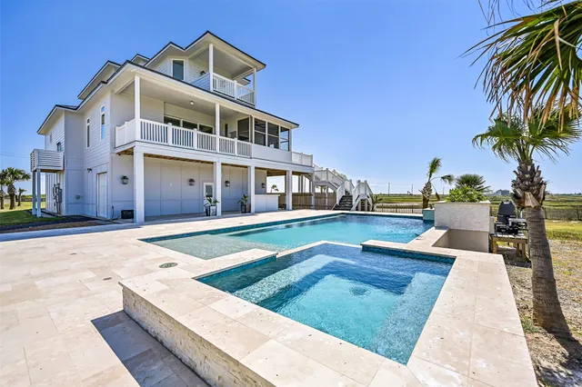 a view of a swimming pool and an ocean