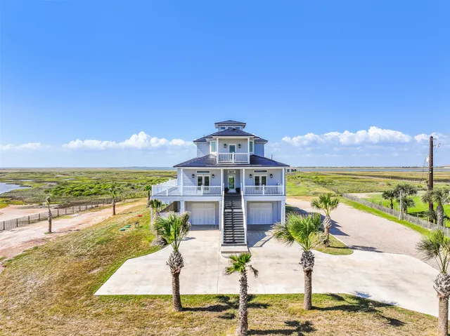 a view of a swimming pool with a lounge chairs