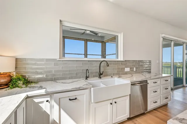 a kitchen with a stove and a sink