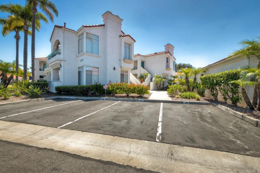 3375 Genoa Way, Unit 144 Oceanside, CA 92056 - Photo 33 of 34 This parking space is conveniently located right out front of your unit.