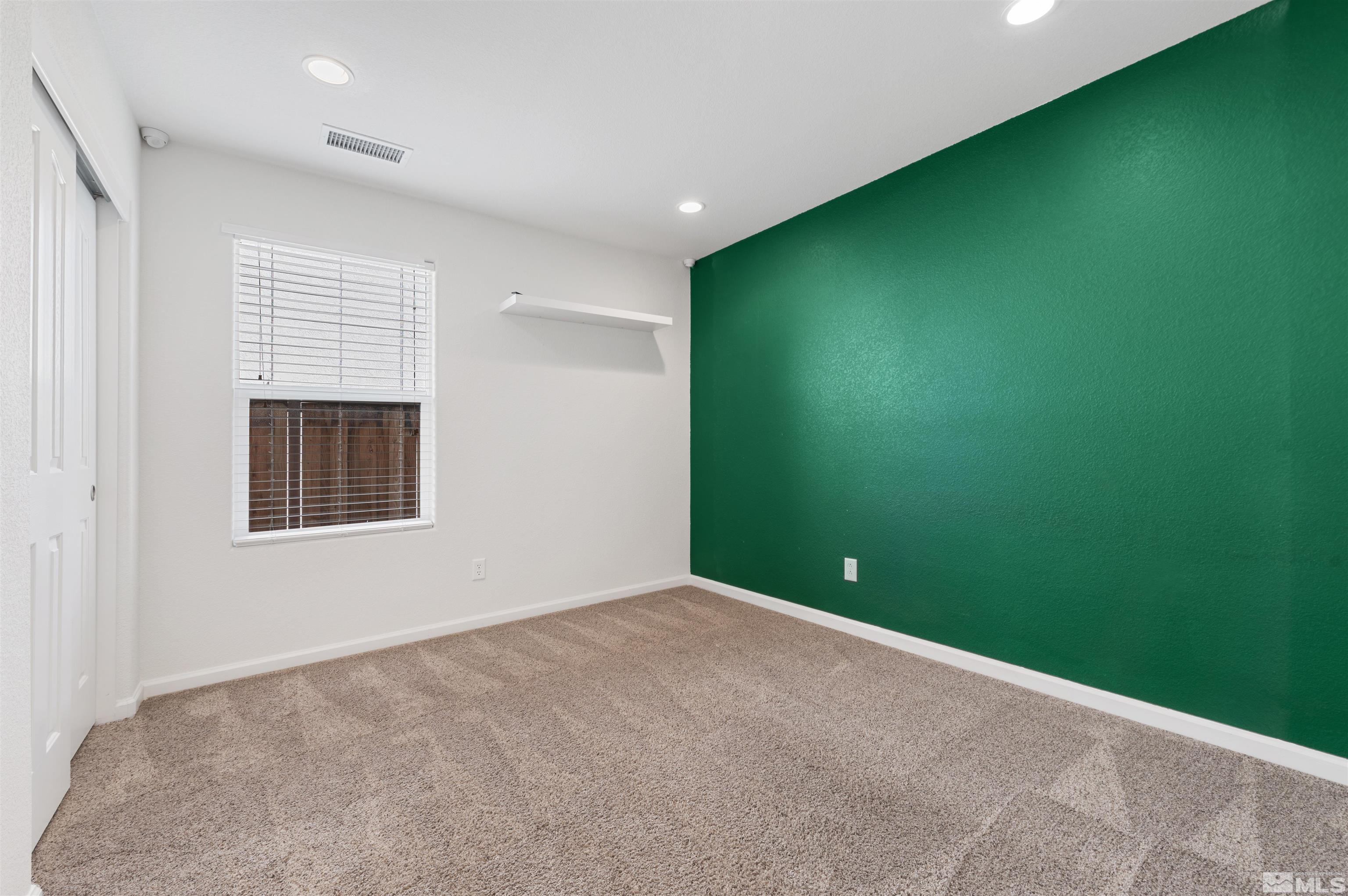 11360 Verazae Drive Reno, NV 89521 - Photo 14 of 22 a view of an empty room with window