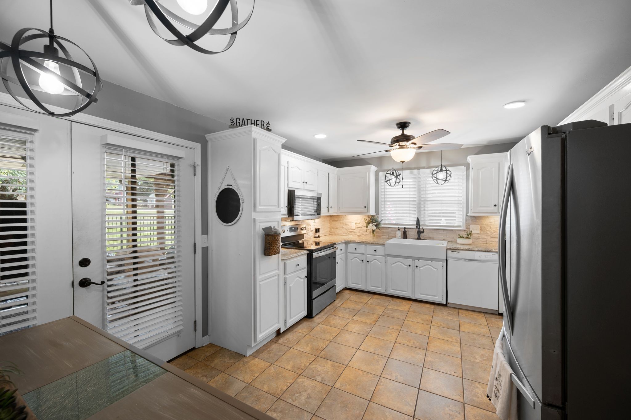 154 B Spring Valley Road Nashville, TN 37214 - Photo 14 of 29 a kitchen with a refrigerator a sink and dishwasher