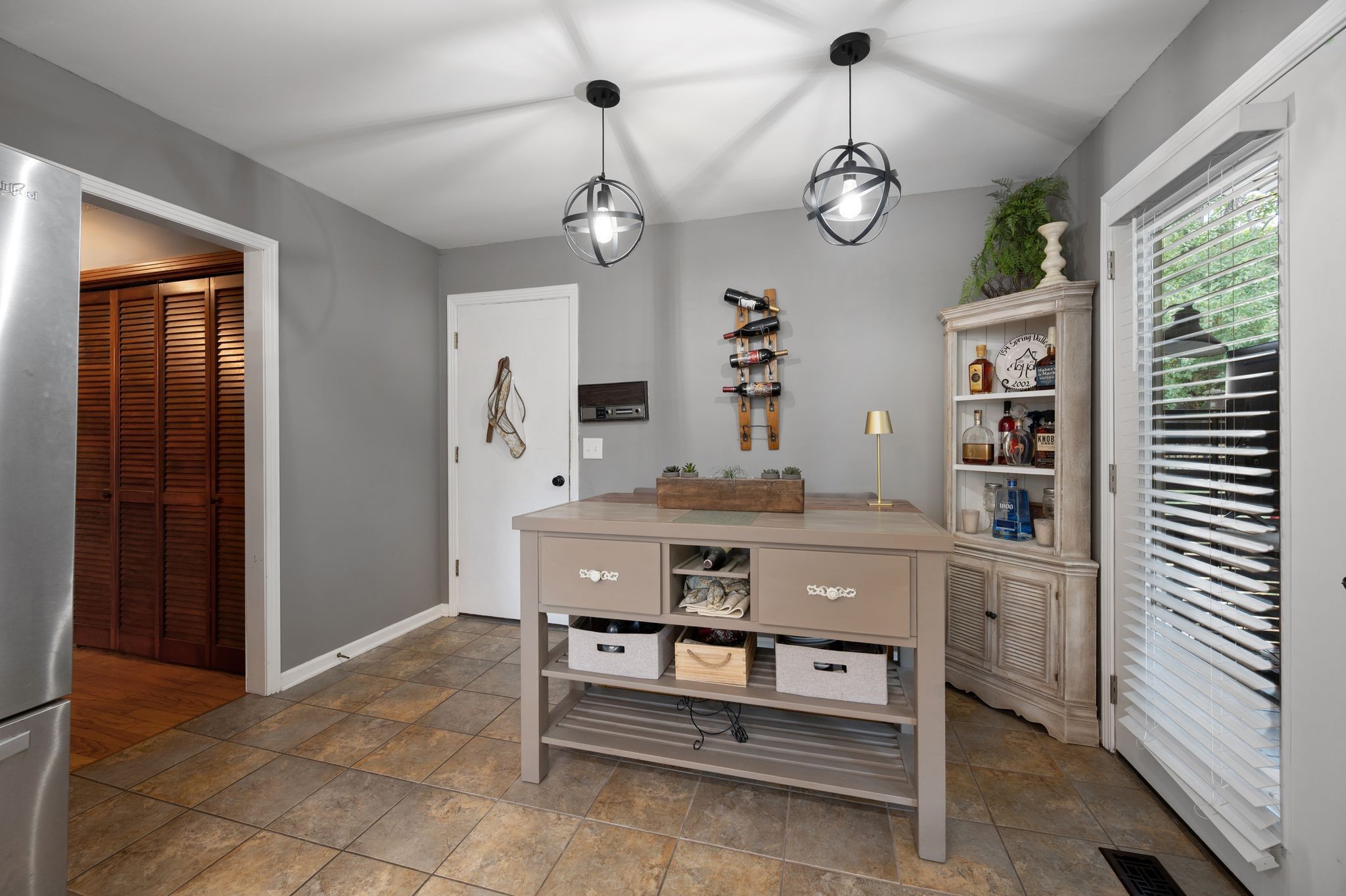 154 B Spring Valley Road Nashville, TN 37214 - Photo 16 of 29 a view of dining room with wooden floor and windows